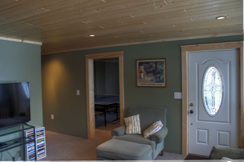 2nd large screen tv and living area on lowest level