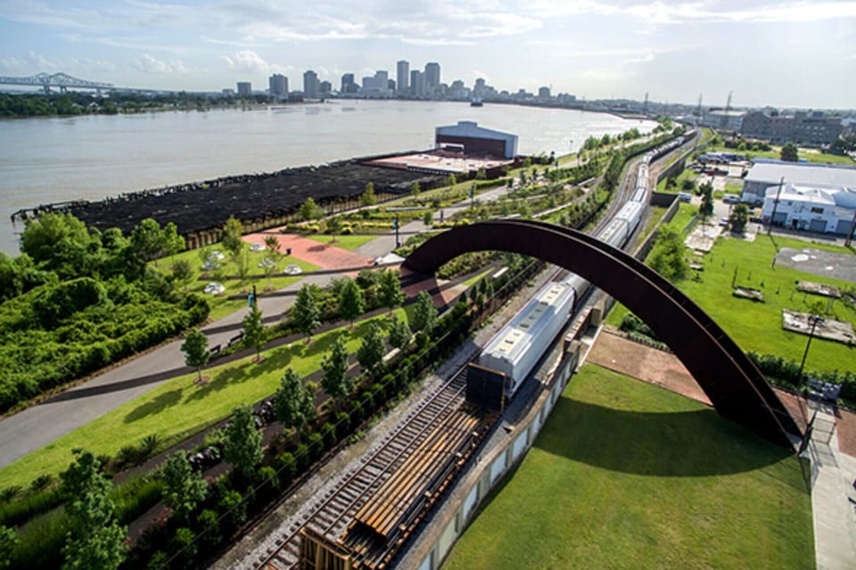 Walk 5 minutes to the new Crescent Park on the Mississippi River.