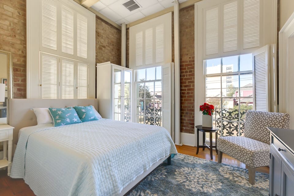 The River Suite view out to Elysian Fields Ave., with privacy shutters.