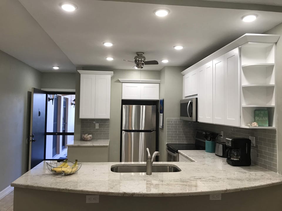 Brand new stainless steel appliances and granite countertop