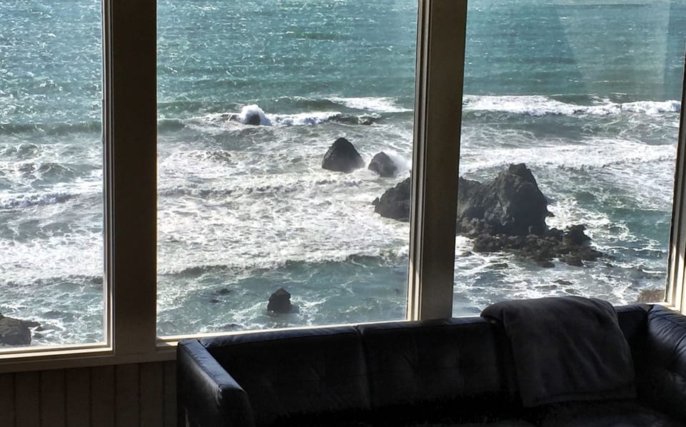 Rocks and crashing waves everywhere. 