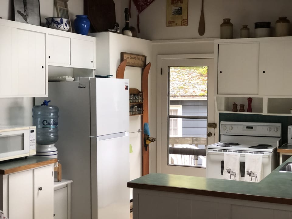 Kitchen and entrance door.