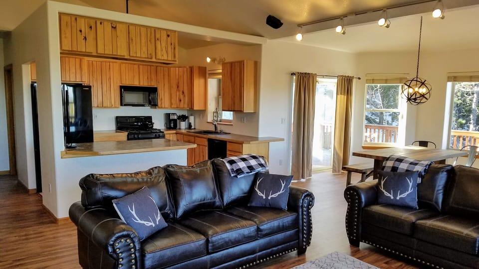 First floor kitchen connected to living and dining room