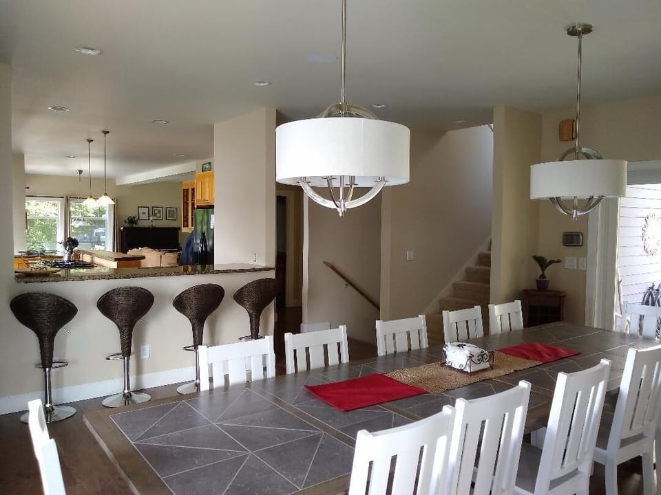Main floor Dining room, eating bar, looking north to kitchen