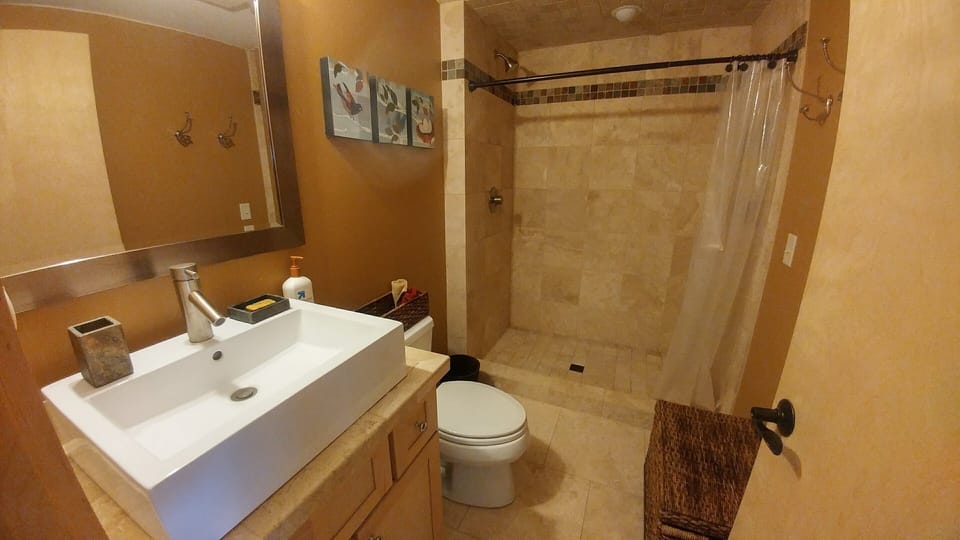 Quality fixtures and tile make for a lovely bathroom.
