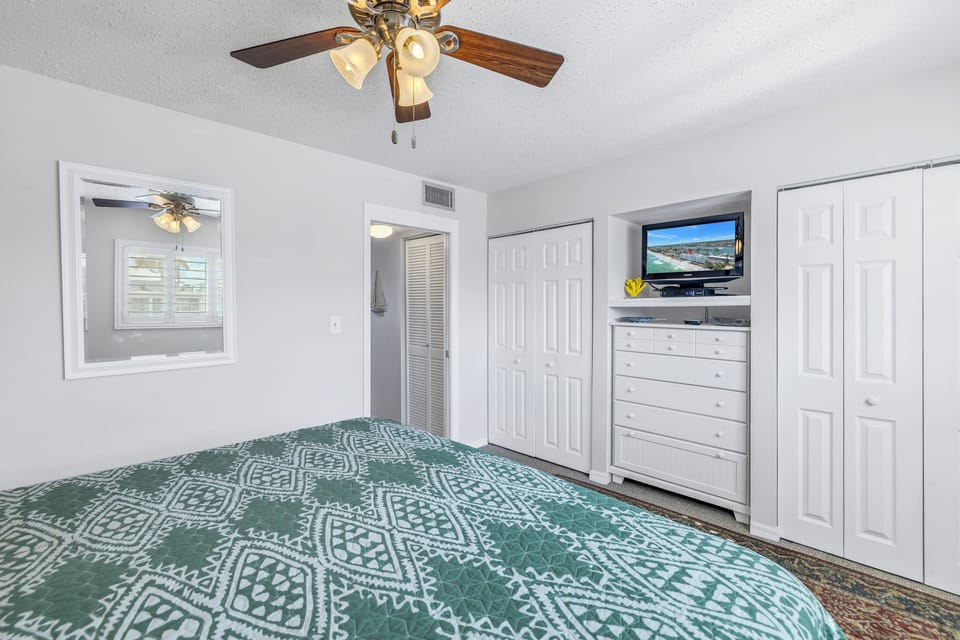 Bedroom has two closets and a flat screen television