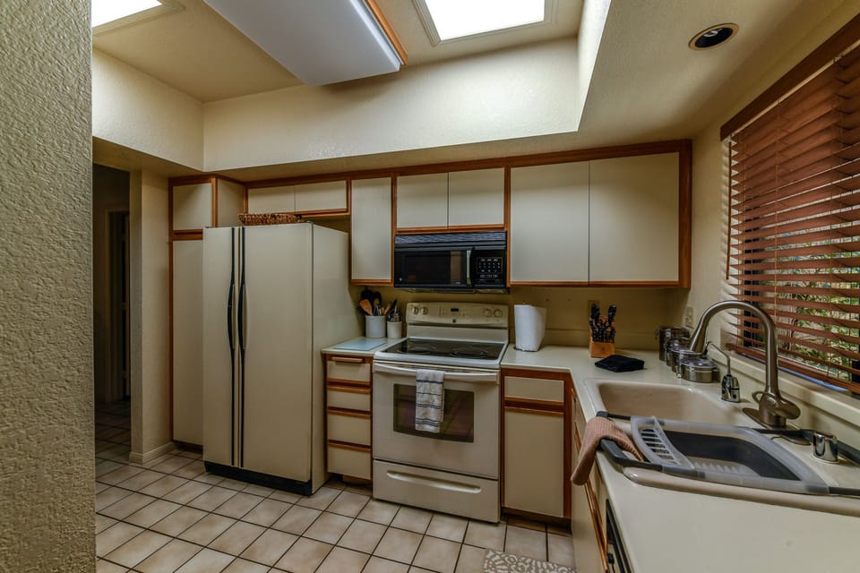 The kitchen has all the appliances.
