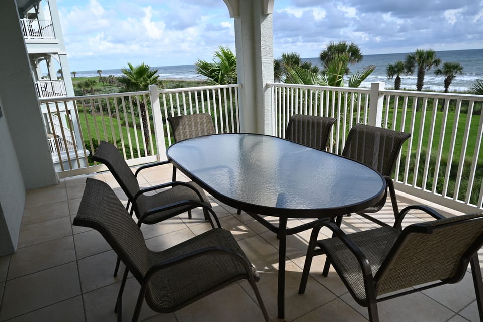 Patio dining with great view of the beach and golf course