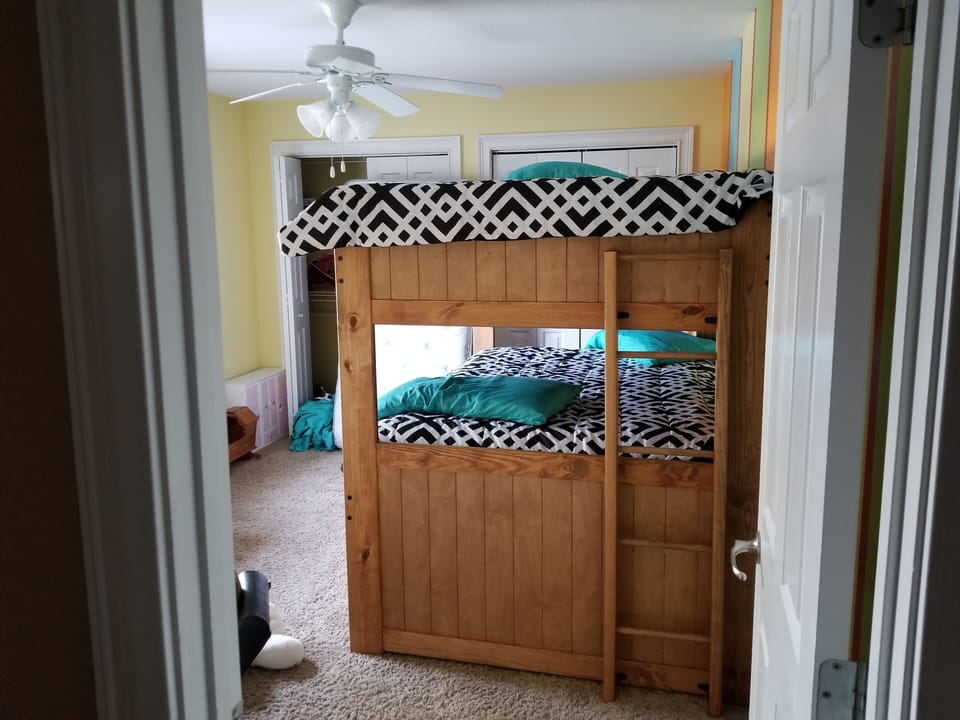 bedroom 3 with bunk beds and trundle