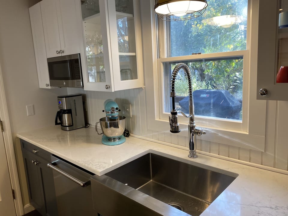 Kitchen is well equipped, including this kitchen aid blender.