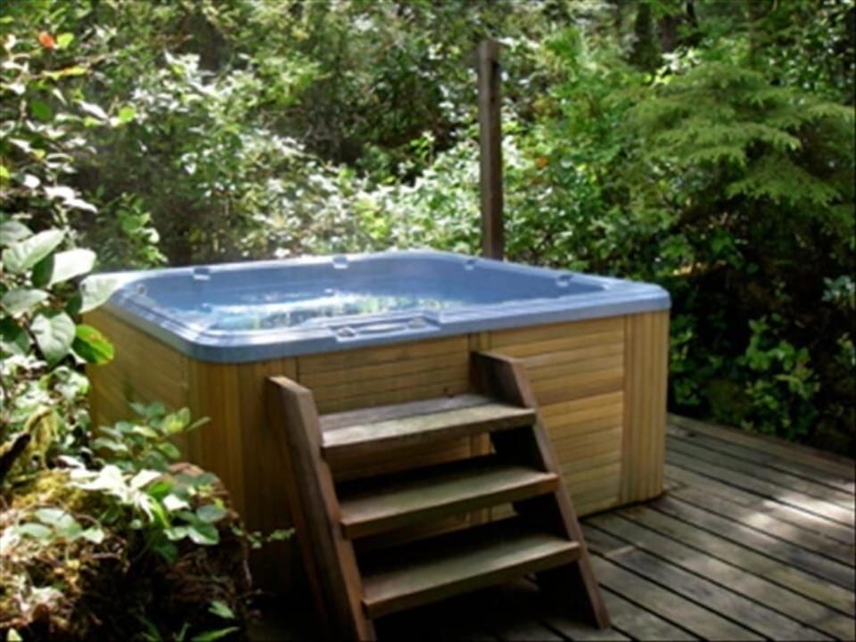 Hot tub in the forest.