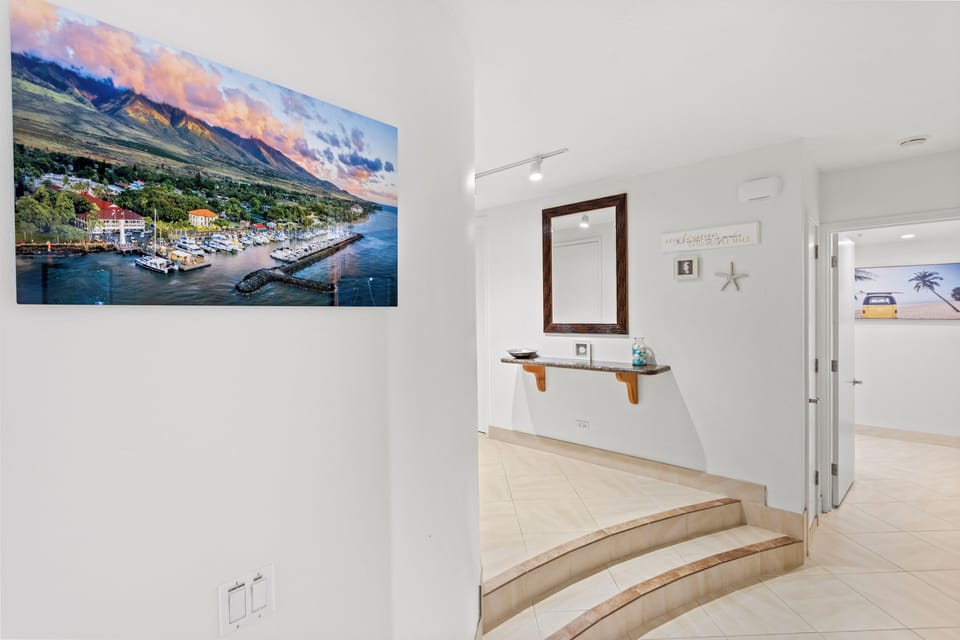 View of the entry with your back to the living room. Master suit in distance. 