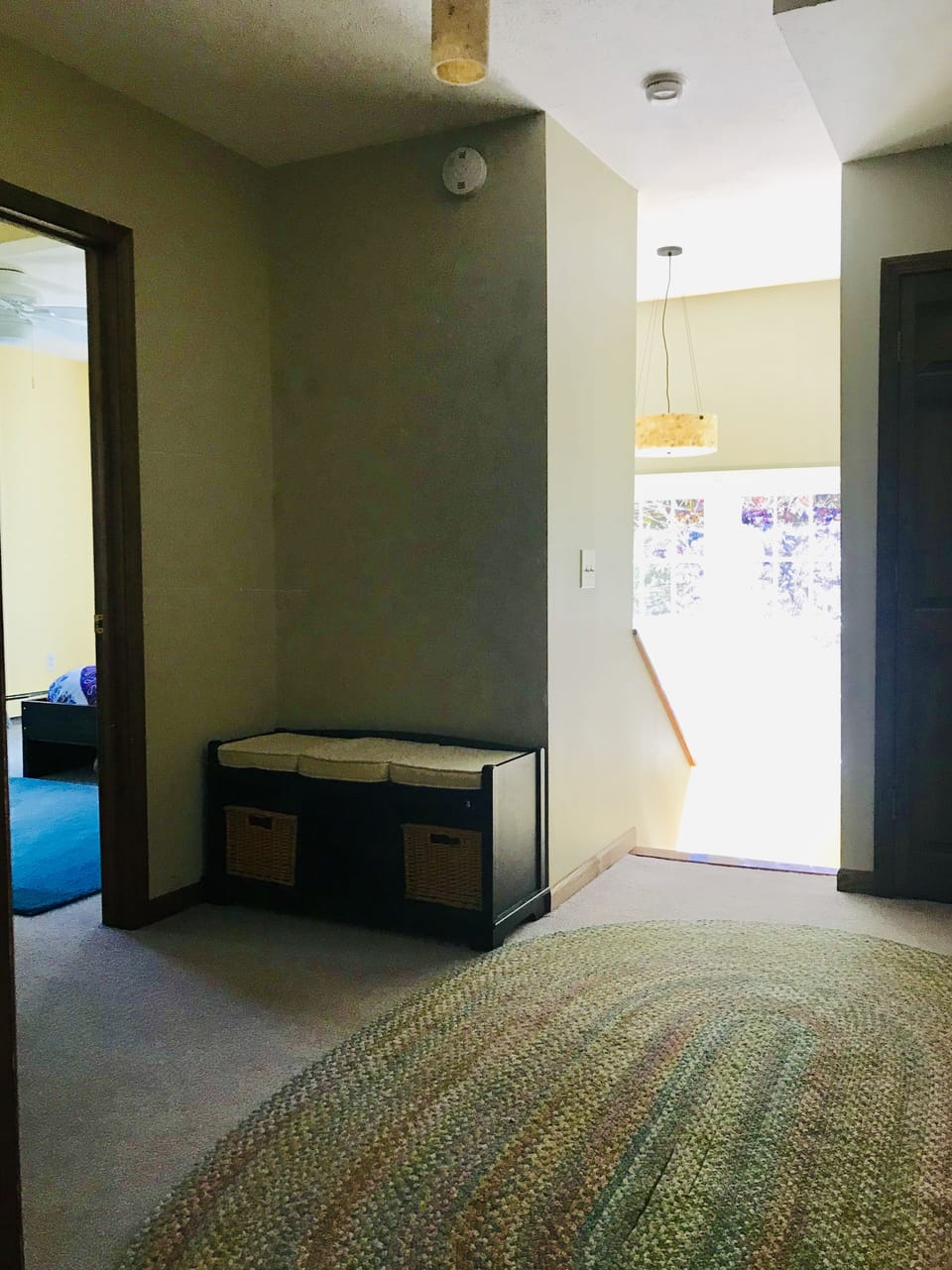 Upper foyer with doors to 3 bedrooms, fully stocked linen closet, and bathroom. 