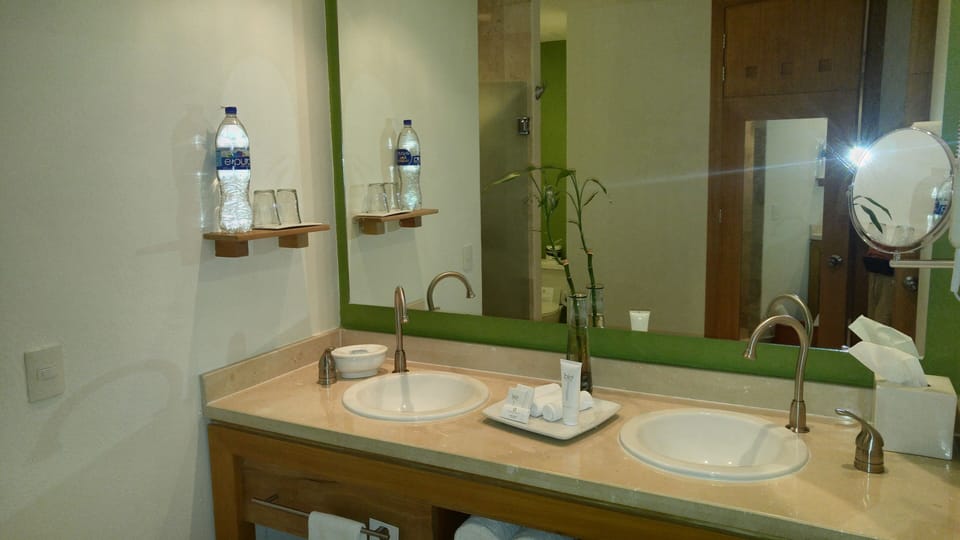 2 full bathrooms, each with double vanities,  shower and soaking tub