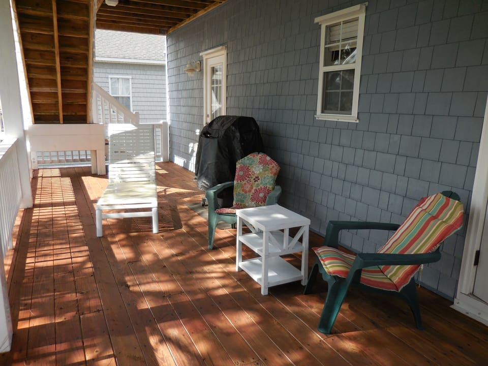 Relax on the main level rear deck - and barbeque too