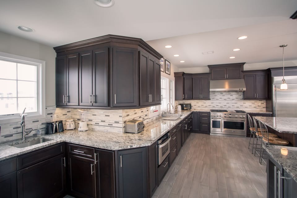 Another view of kitchen with Monogram appliances