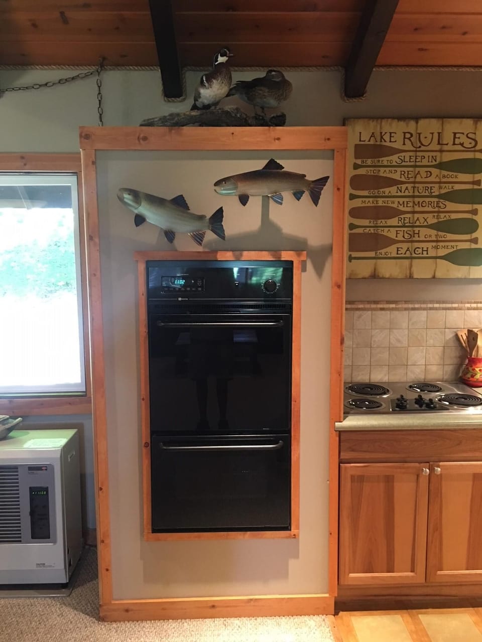 Double ovens and 4 burner electric stove with all the pots and pans you need