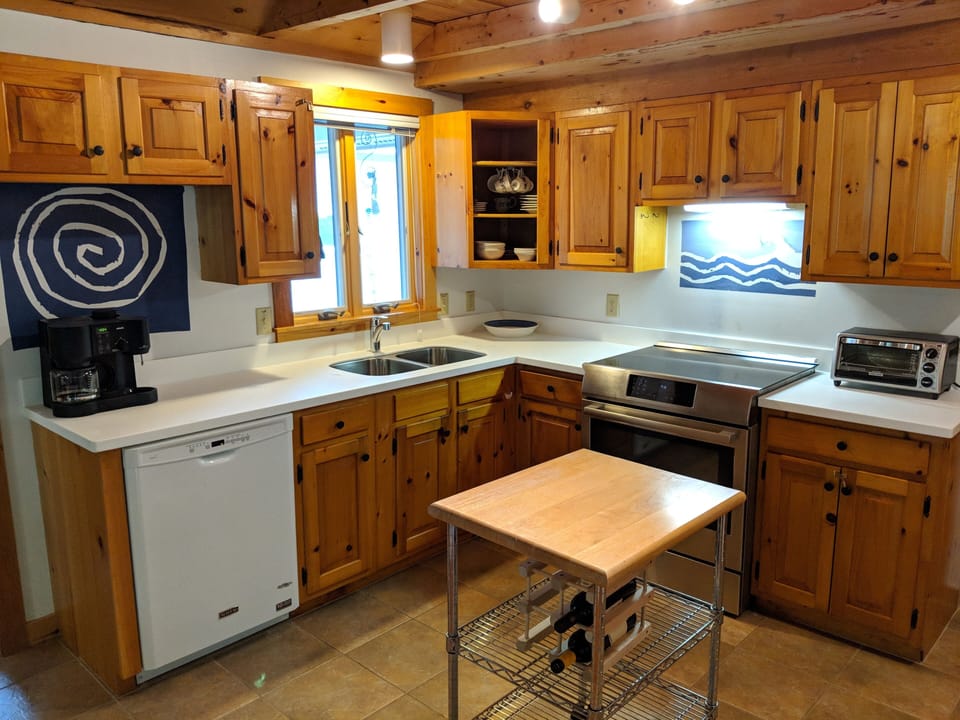 kitchen with quartz counter, induction stove