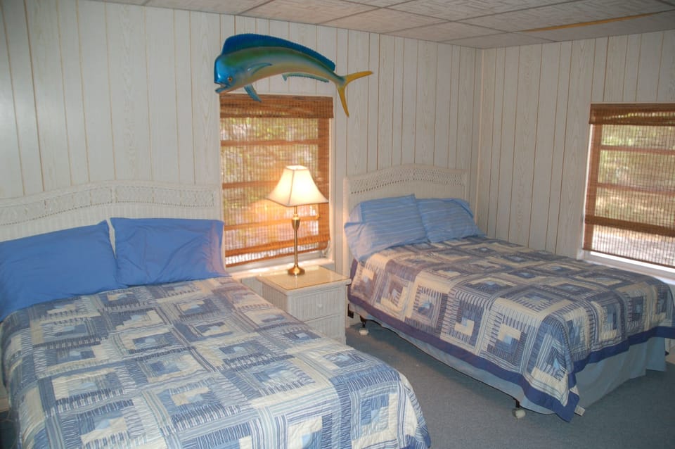 Second bedroom with two full size beds