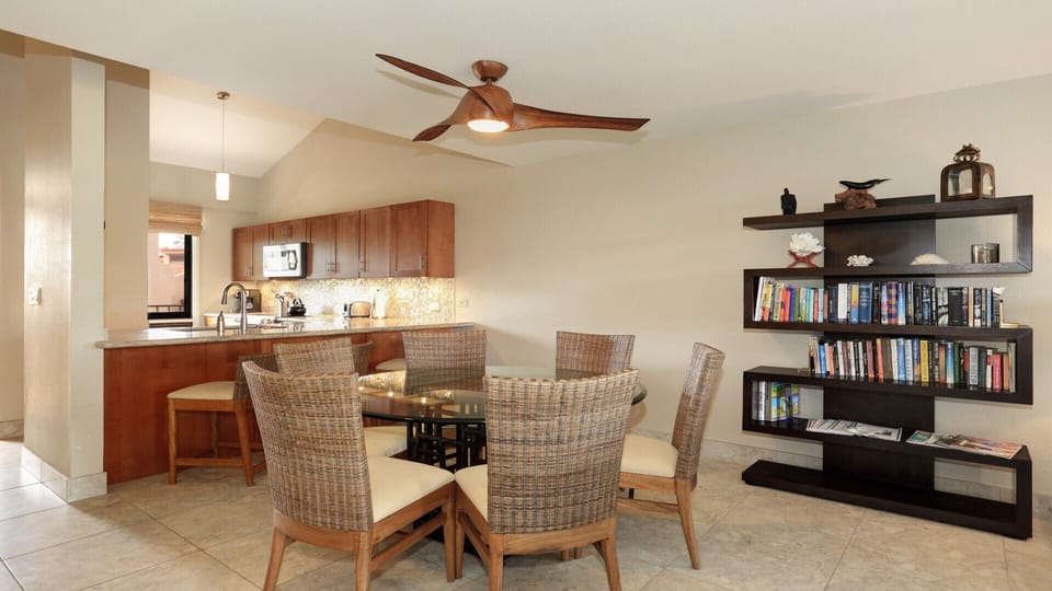 Dining room seats six; three barstools at kitchen bar area