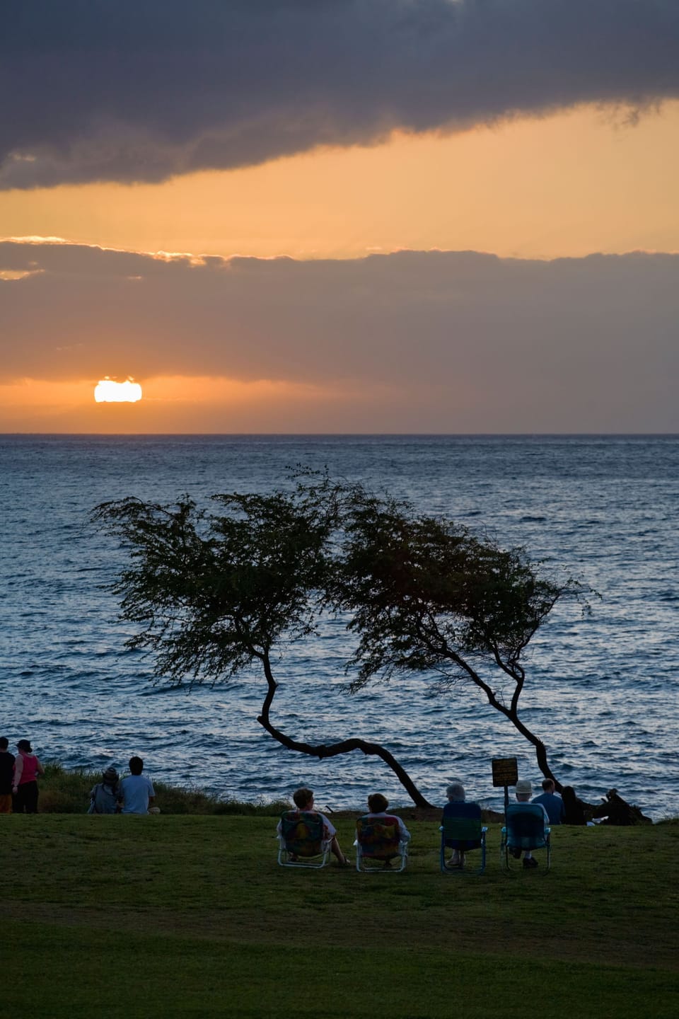 This could be you watching the sunset at the Kam Beach III Park lawn