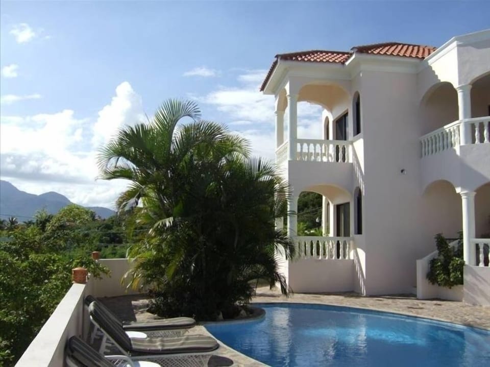 Porches overlooking the pool and Playa Cofresi