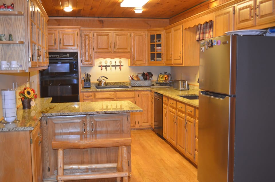 Gas stovetop, wall oven, microwave, mini wine refrigerator, and sooooo much more