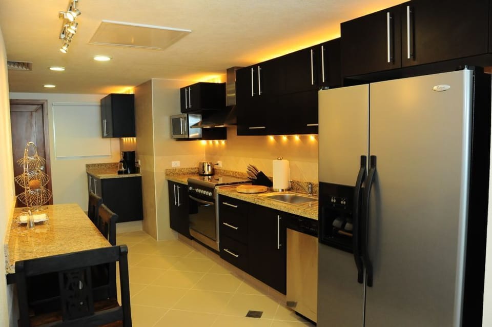 Ultramodern kitchen with eat-in counter seating.