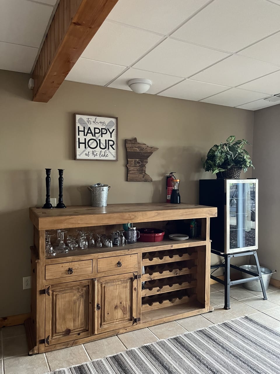 The spacious area in lower level has room for snacks/drinks along with a fridge.