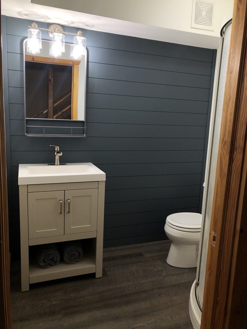 The lower level bathroom with a shower