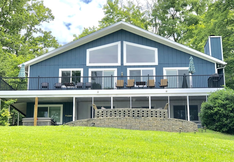 Lake Front view of the house.  New (2019) Hot Tub on lower left.