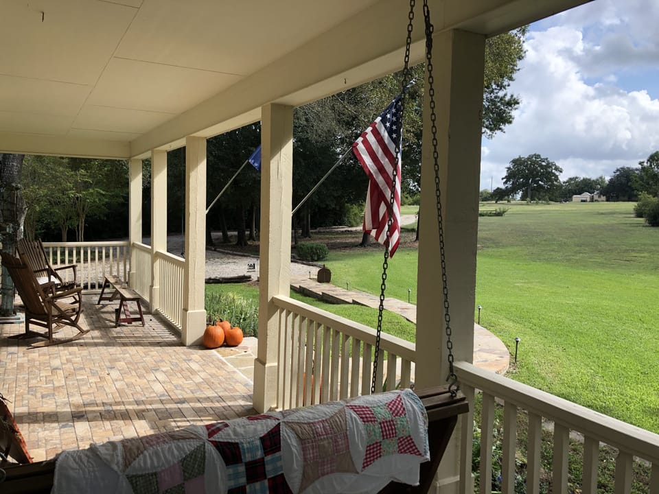 Large front porch to watch the sunrise or enjoy the afternoon shade