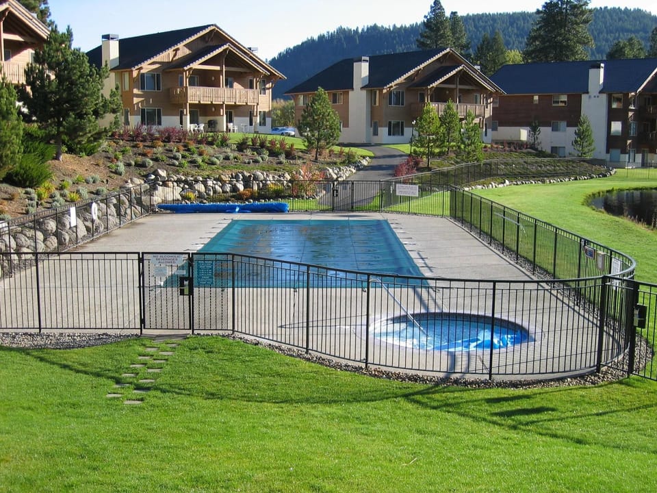 Pool and hot tub (condo buildings in the background)