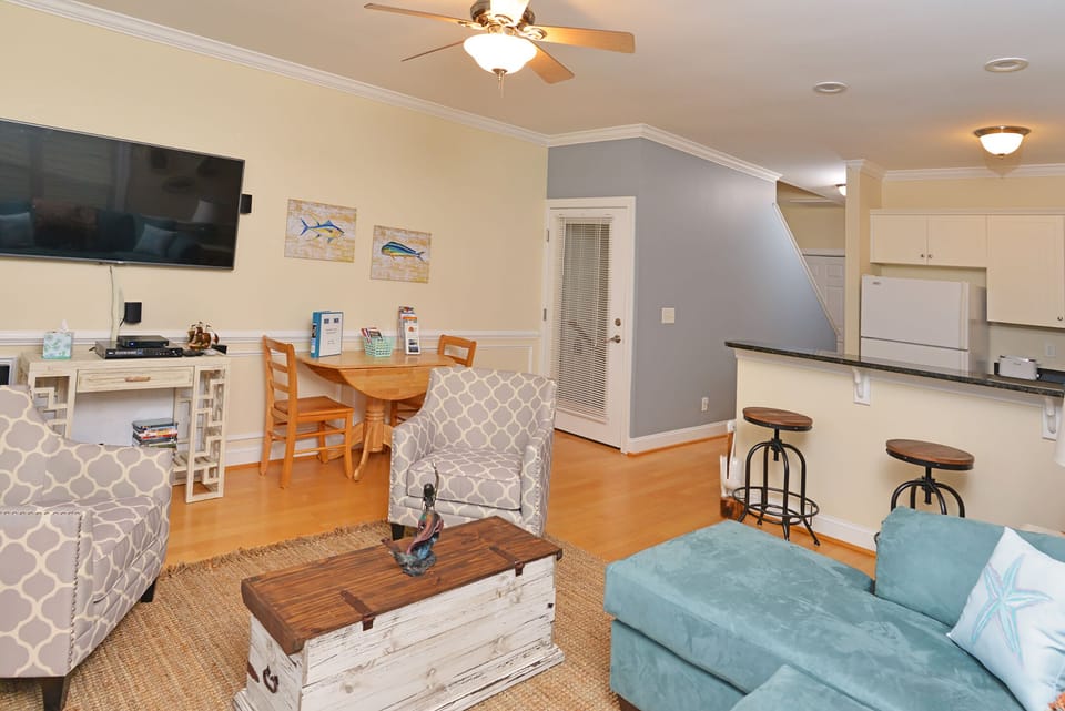 Front door, opening into a welcoming living area, with all new furnishings