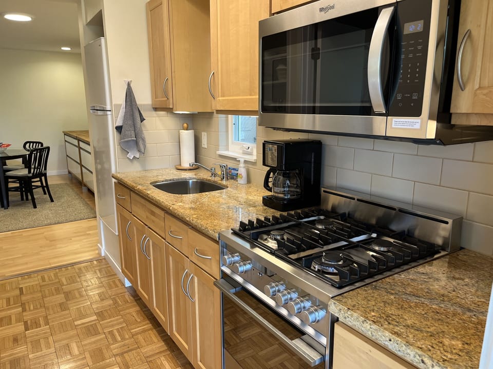 The kitchenette is off of the dining area.