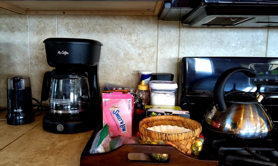 coffee maker and grinder, kettle. Coffee, sugar, creamer etc. are not provided 