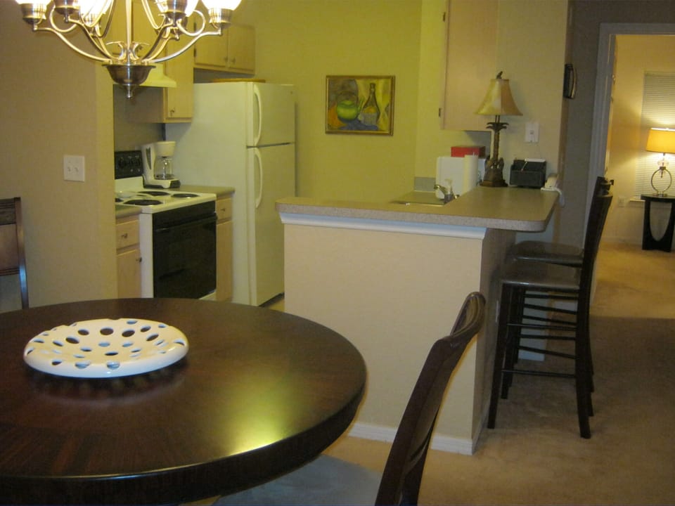 Dining and kitchen areas.