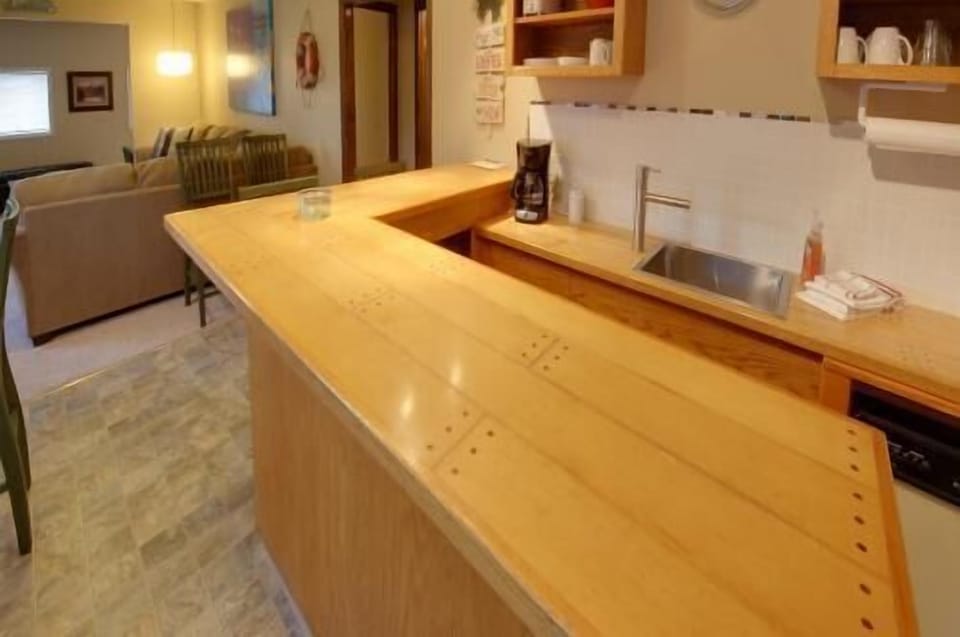 Lower level kitchenette/bar area.
