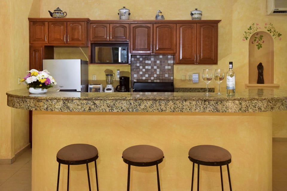 open kitchen with granite counters