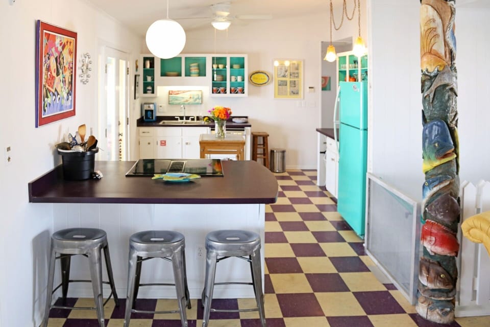 Kitchen has 3 stools at the bar!