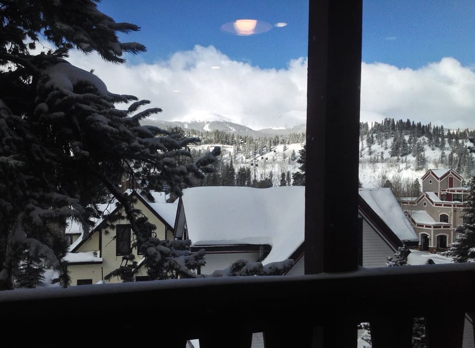 Looking out condo window onto gondola 