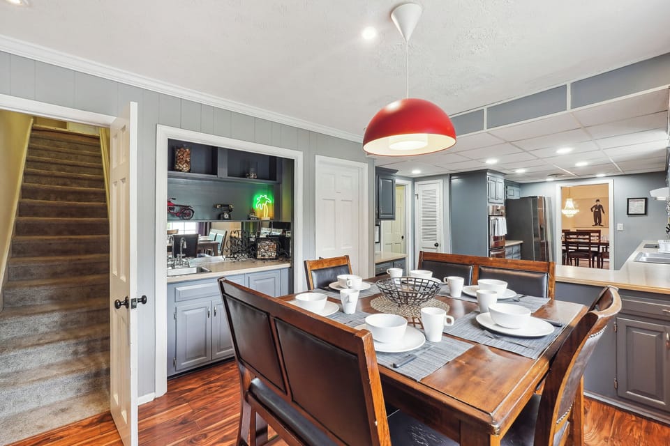 Eat-In Kitchen Area with Bar Area and staircase up to Master Bedroom -Main Level