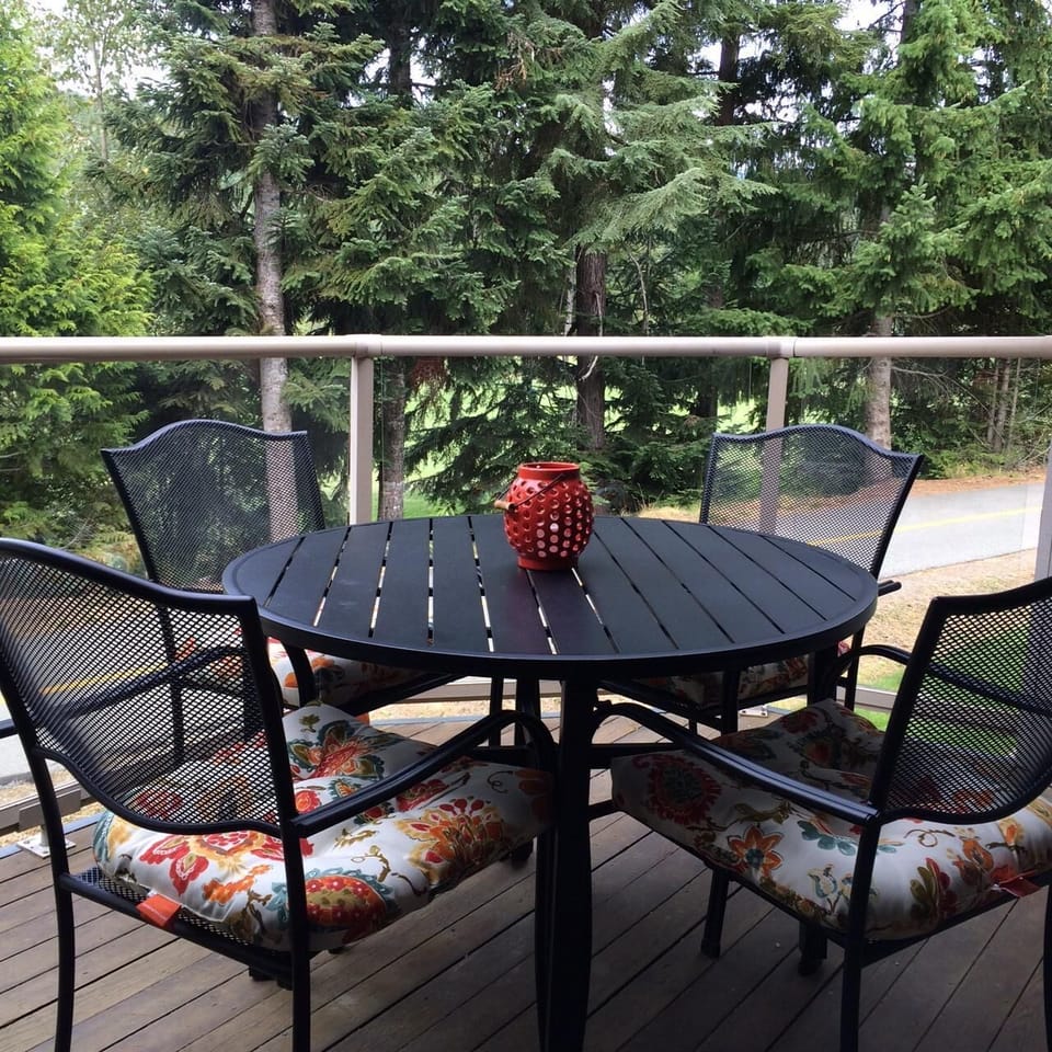 Deck overlooking Chateau Whistler Golf Course and walking path to Lost Lake