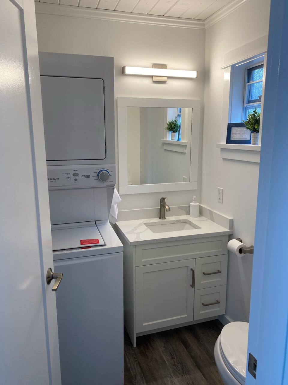 Main level washroom with laundry 