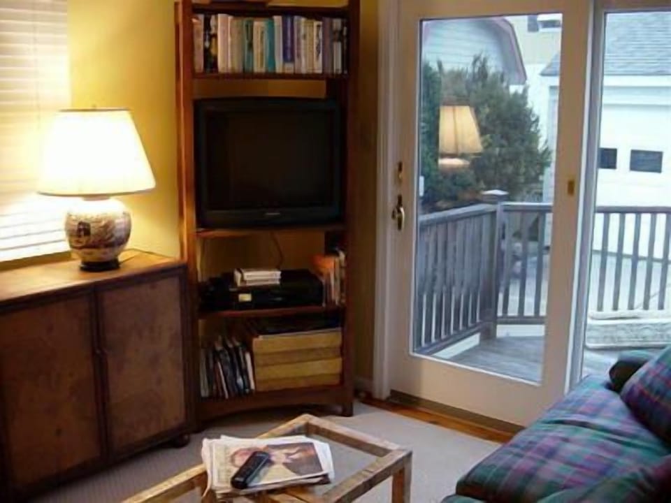 Den, with access to deck.