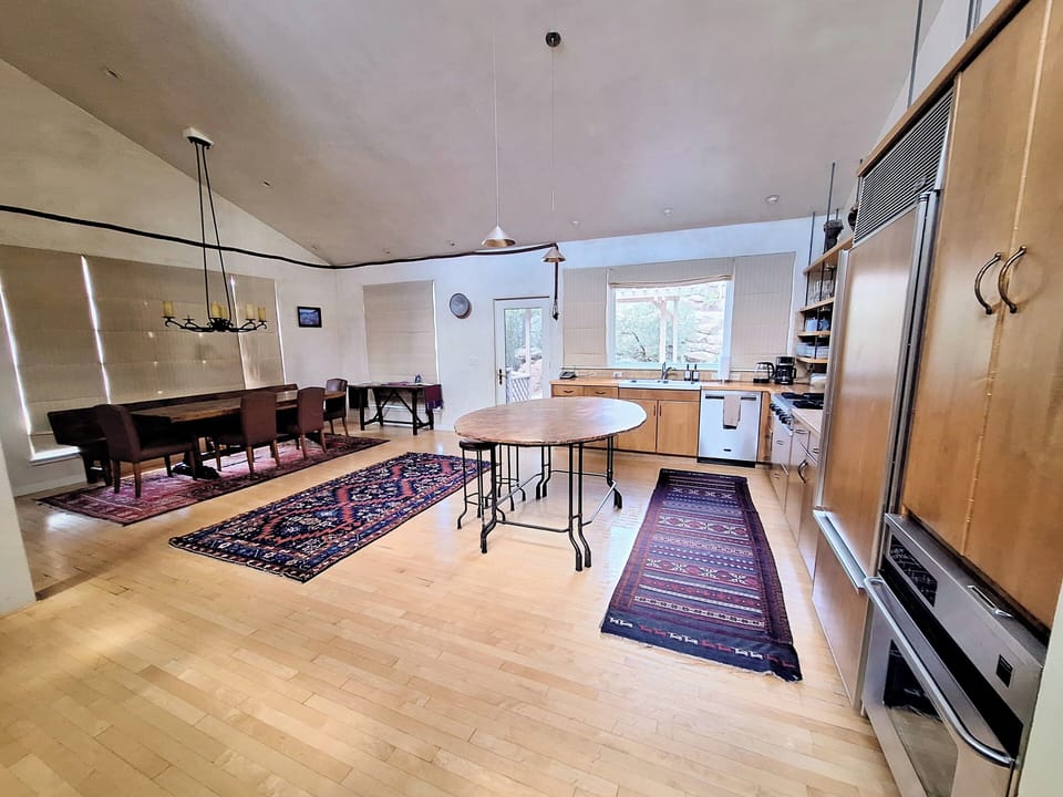 Kitchen and dining room in the open floor plan upstairs