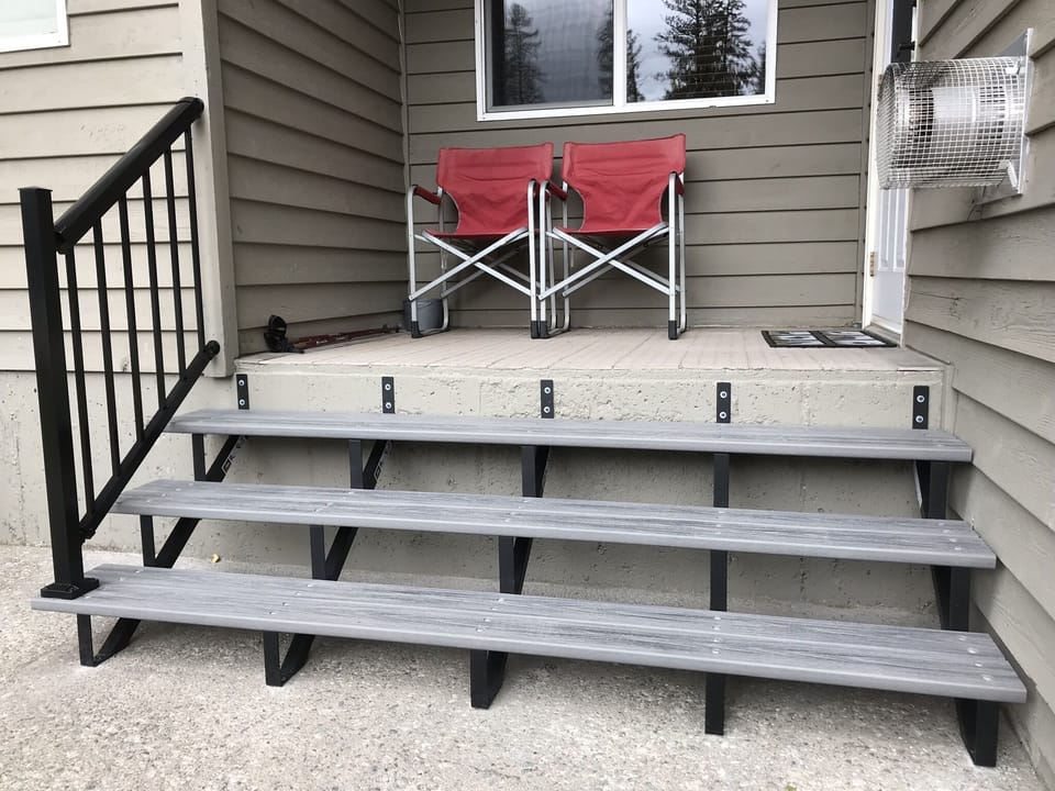 Condo outside patio and entrance from parking lot
