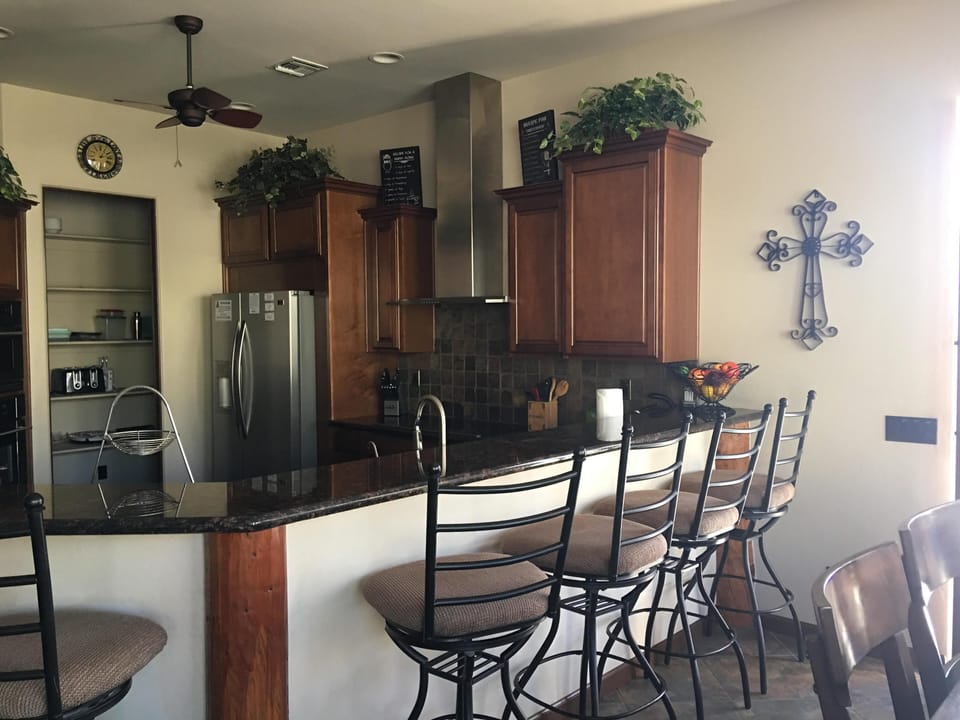 Kitchen, top of line appliances, crockpot, rice cooker, more etc. & 5 bar seats.