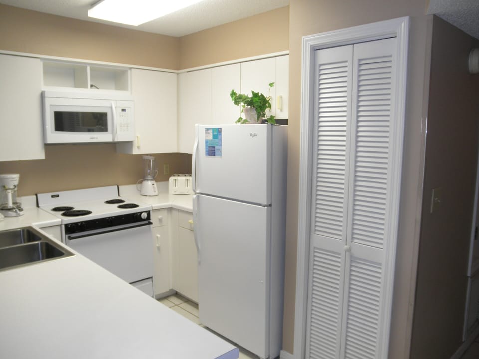 Kitchen with updated microwave.