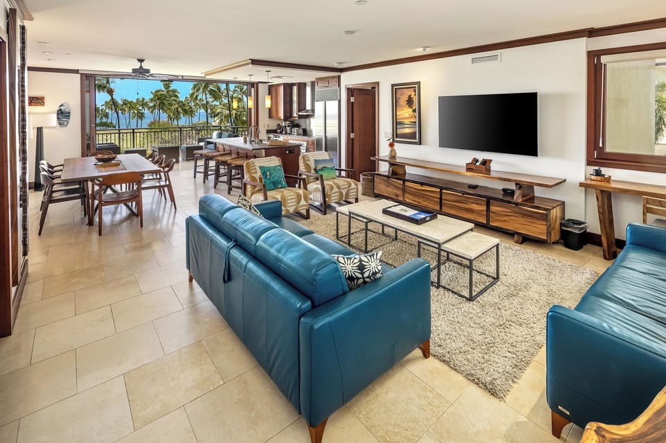 Spacious living area with modern Hawaiian decor
